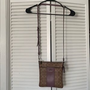 Cross body purple coach purse